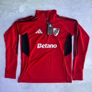 BUZO ENTRENAMIENTO RIVER PLATE 2026/27 (ROJO Y NEGRO)