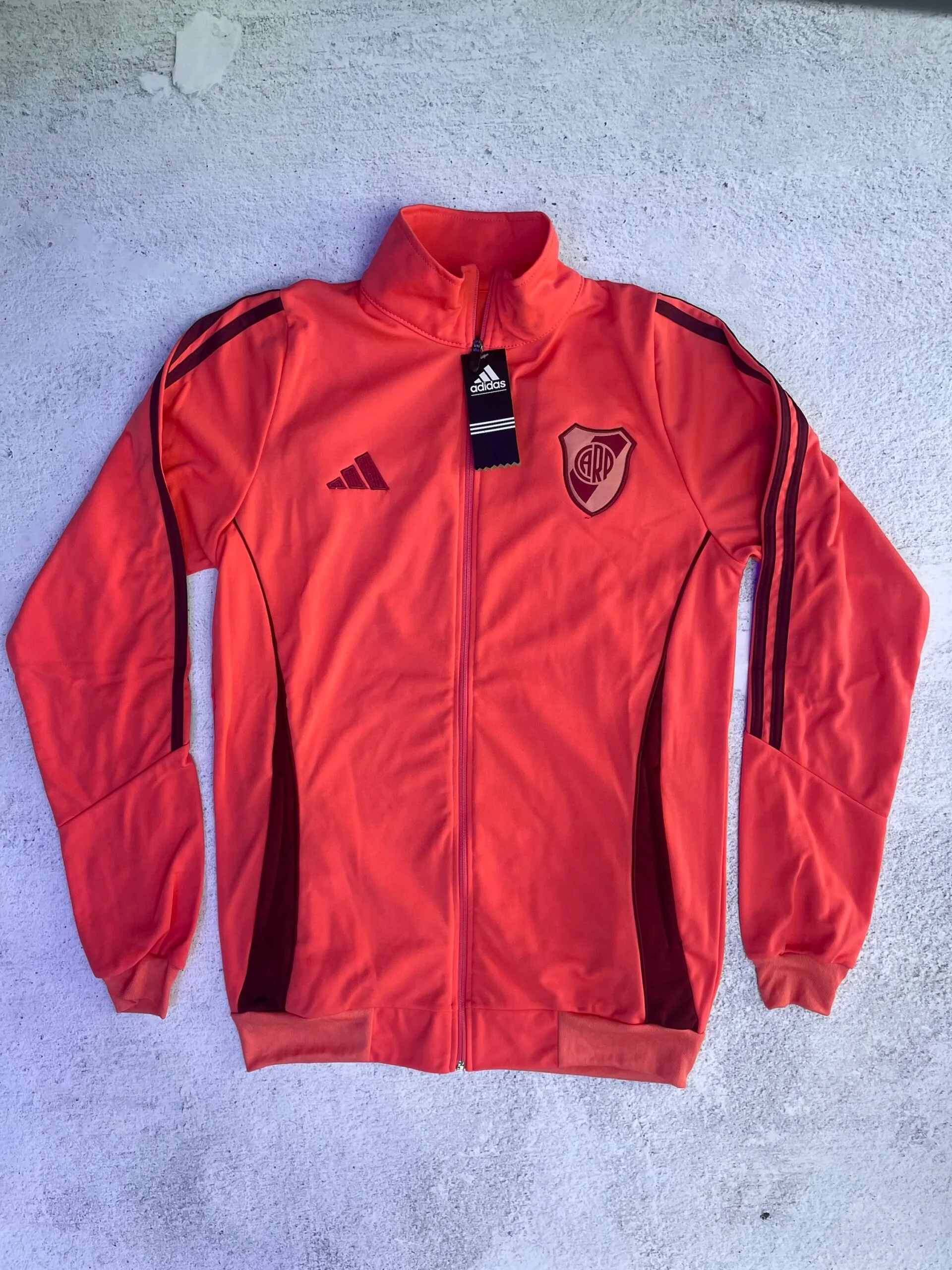 CAMPERA RIVER PLATE 2026 (SALMÓN)